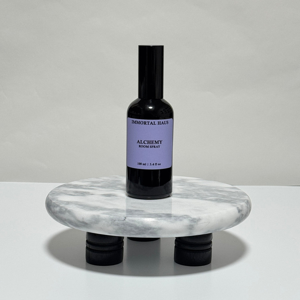 Alchemy room and linen spray in black glass bottle, plum, amber, and black tea scent, 3.4oz