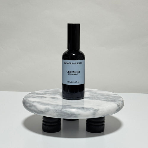Ceremoni room and linen spray in black glass bottle, palo santo, sage, and amber scent, 3.4oz