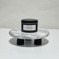 Ceremoni travel candle in charcoal gray tin, palo santo, sage and rosewood scent, 6.3 oz single wick