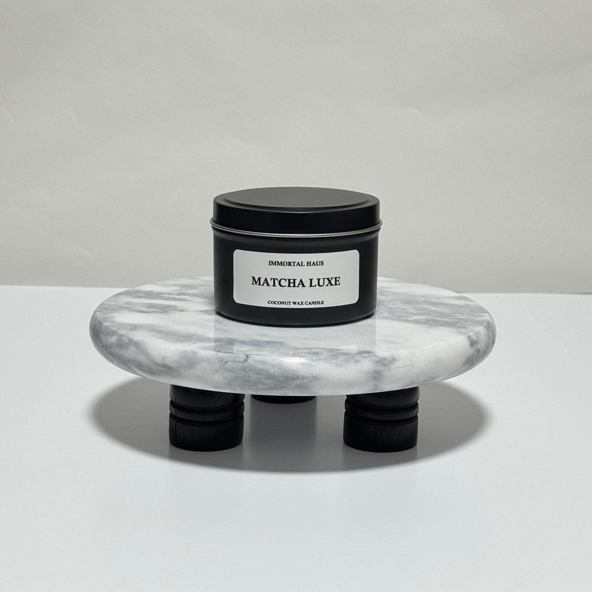 Matcha Luxe travel candle in charcoal gray tin, green tea and cream scent, 6.3 oz single wick