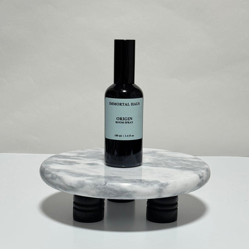 Origin room and linen spray in black glass bottle, peppermint, eucalyptus, and coconut milk scent, 3.4oz