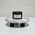 Origin travel candle in charcoal gray tin, peppermint and coconut milk scent, 6.3 oz single wick