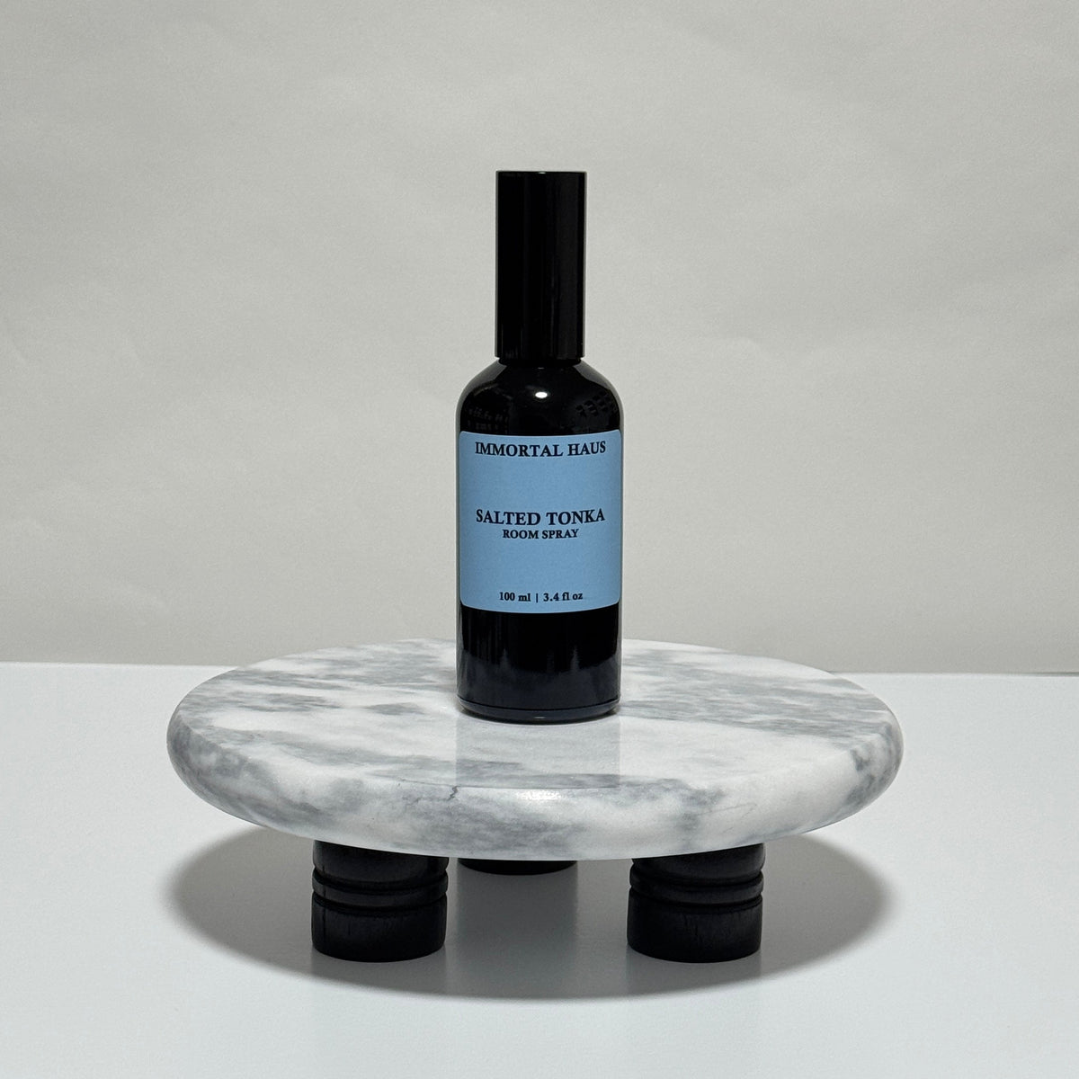 Salted Tonka room and linen spray in black glass bottle, sea salt, tonka bean, and amber scent, 3.4oz