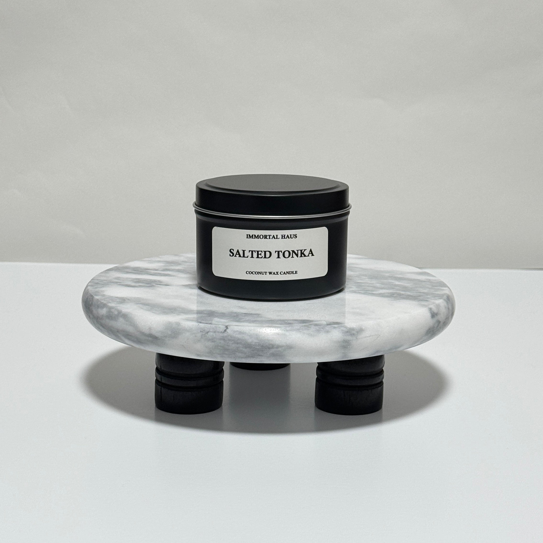 Salted Tonka travel candle in charcoal gray tin, sea salt and tonka bean scent, 6.3 oz single wick